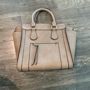 CHARMING CHARLIE PURSE. Beautiful brown shade and includes an optional strap.